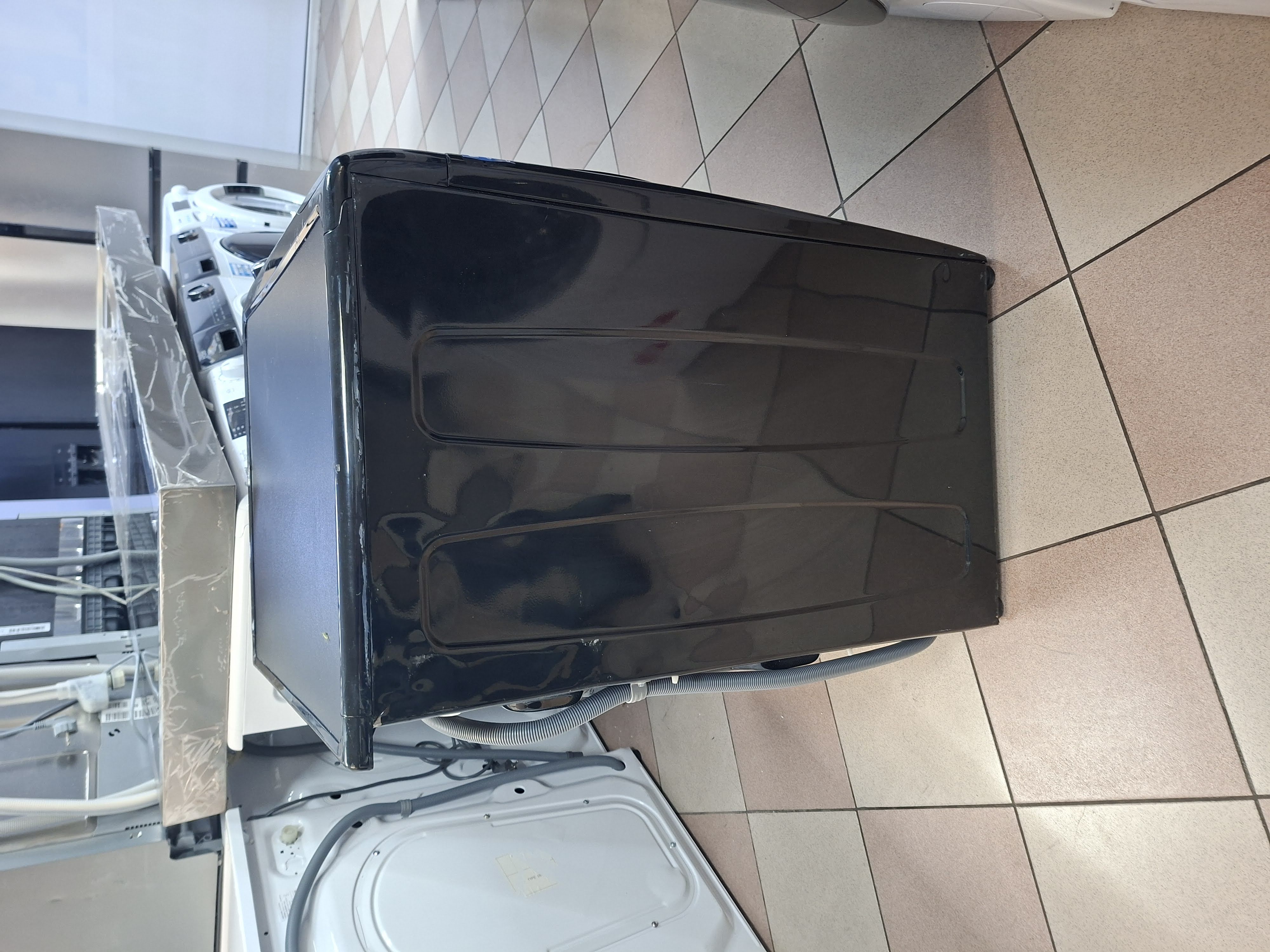 Veš mašina Candy HES12104TWMBB6-S , 10 kg.