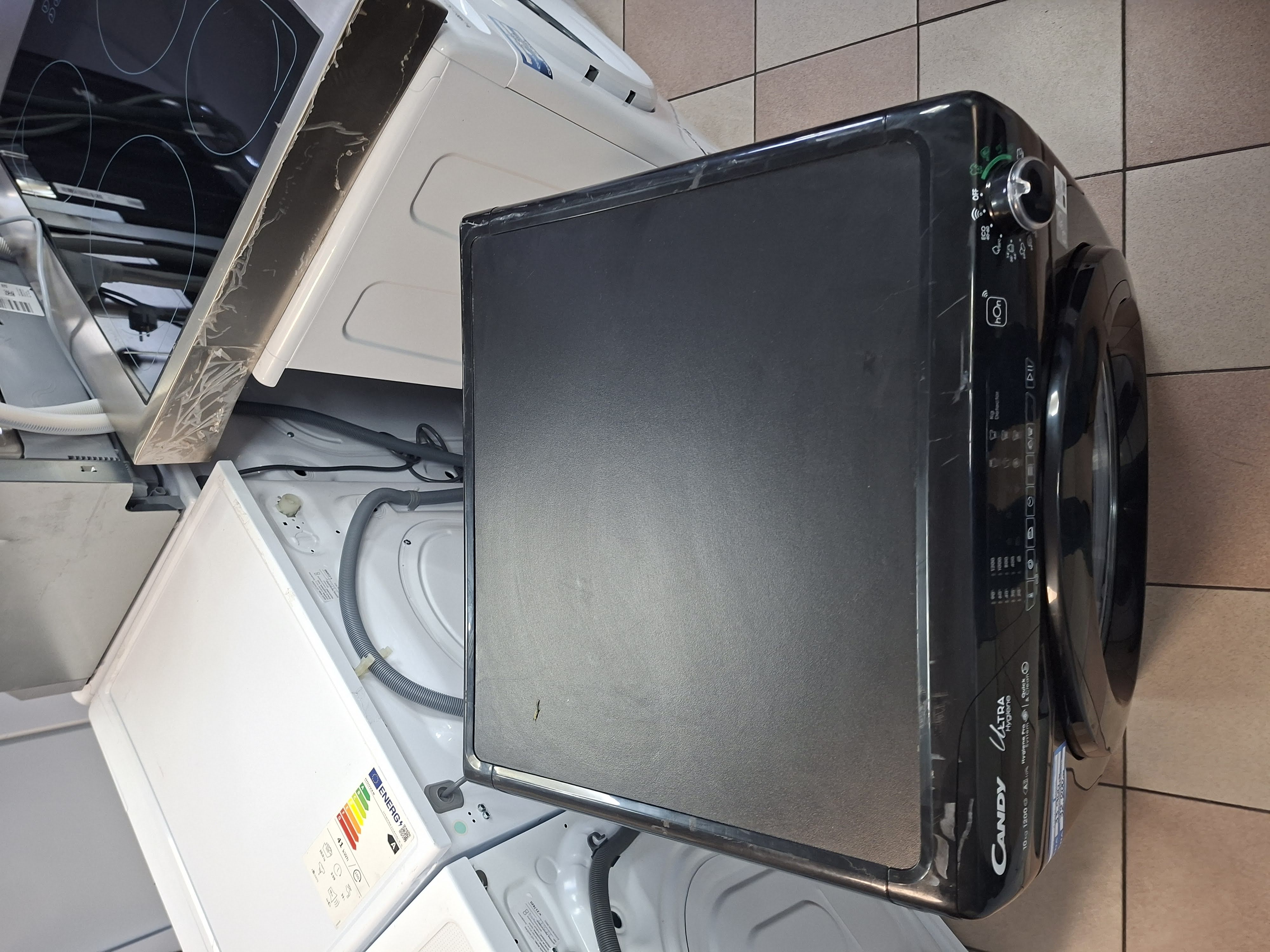 Veš mašina Candy HES12104TWMBB6-S , 10 kg.