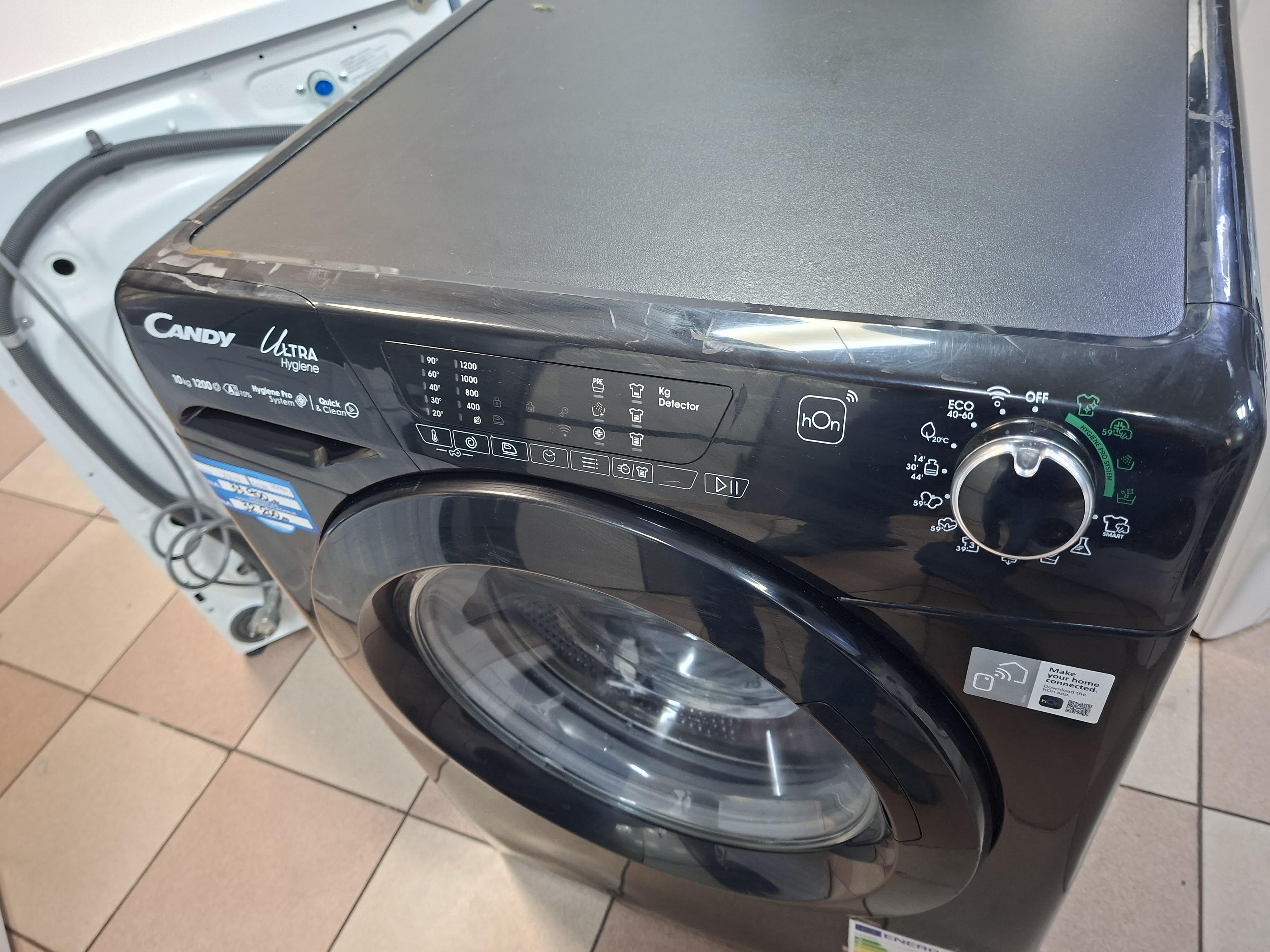 Veš mašina Candy HES12104TWMBB6-S , 10 kg.