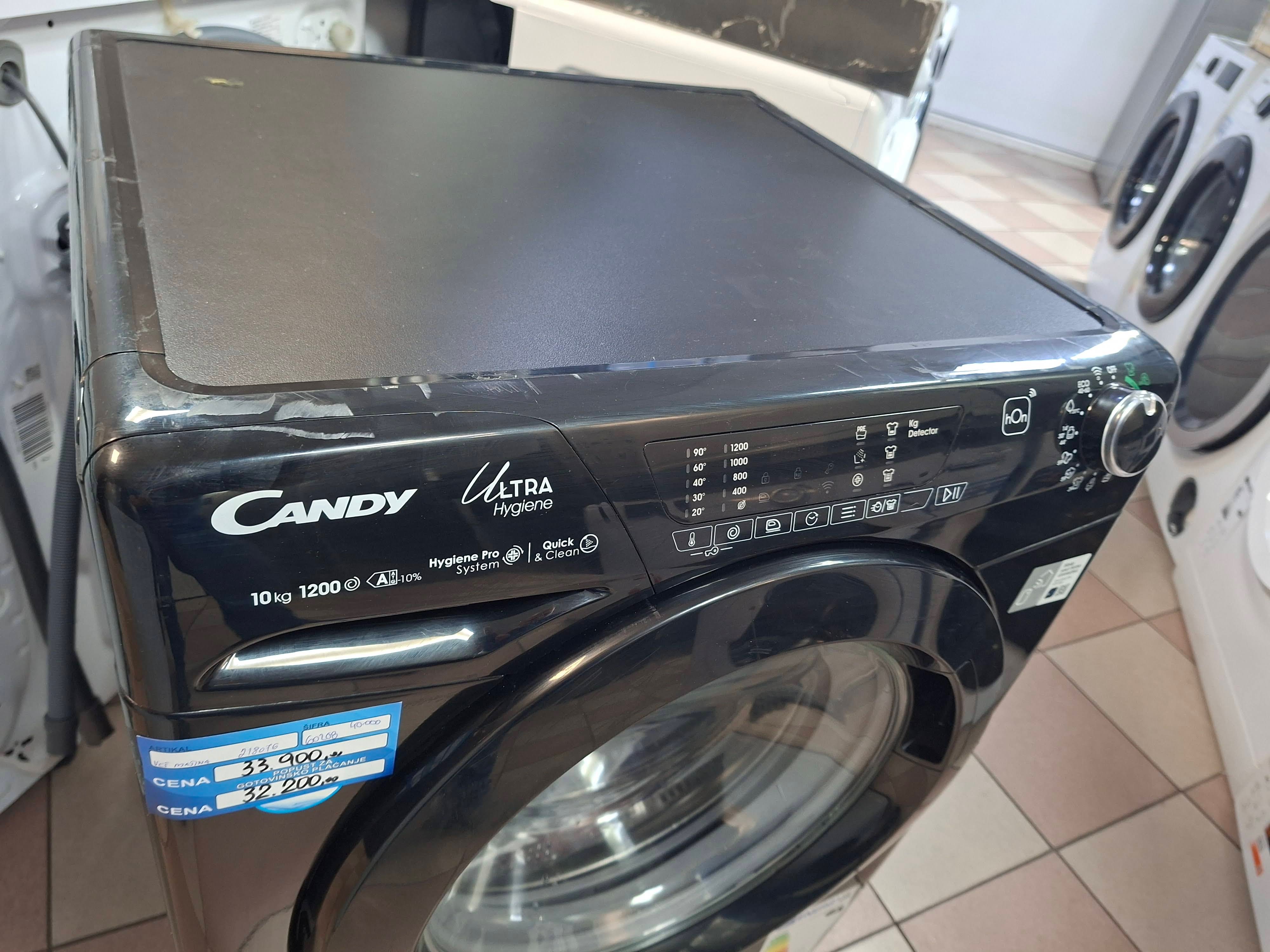 Veš mašina Candy HES12104TWMBB6-S , 10 kg.