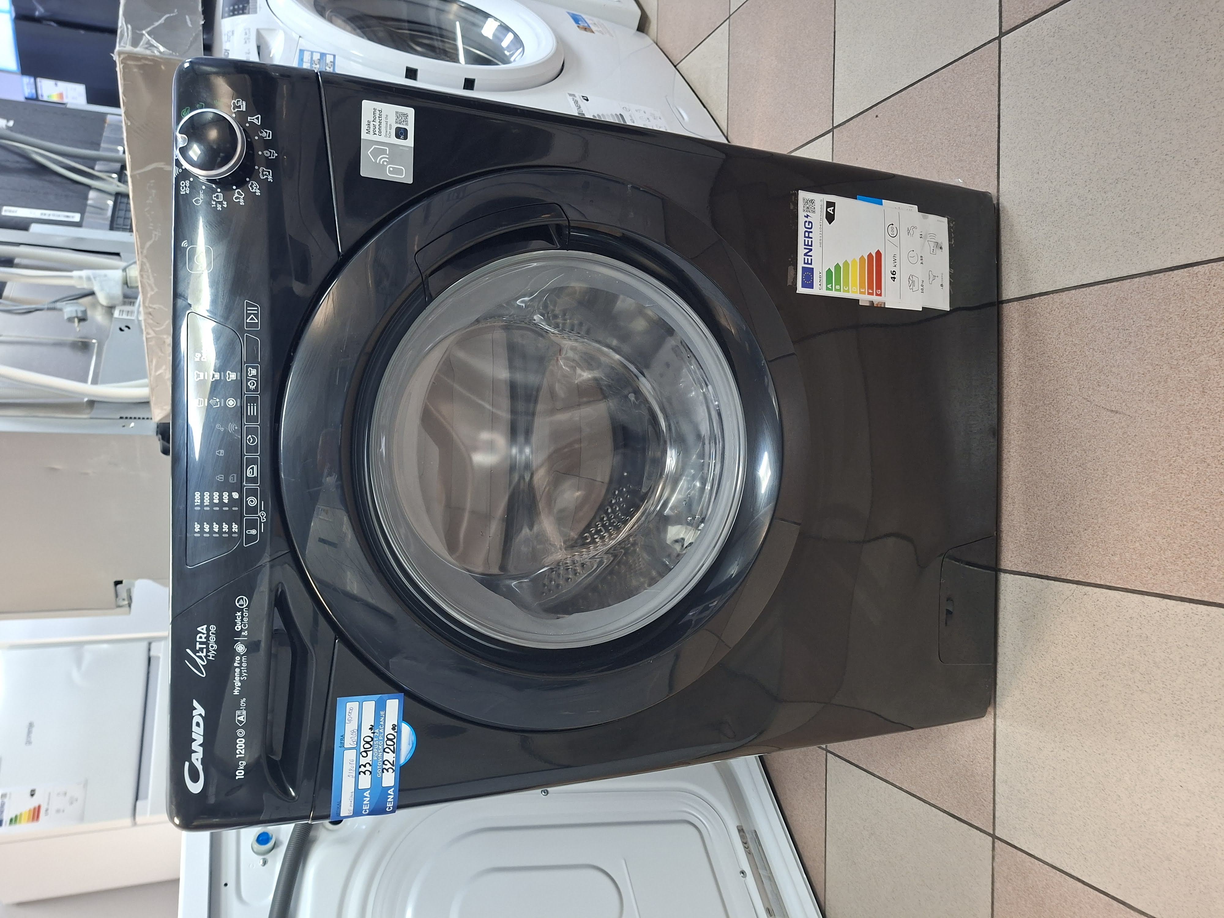 Veš mašina Candy HES12104TWMBB6-S , 10 kg.