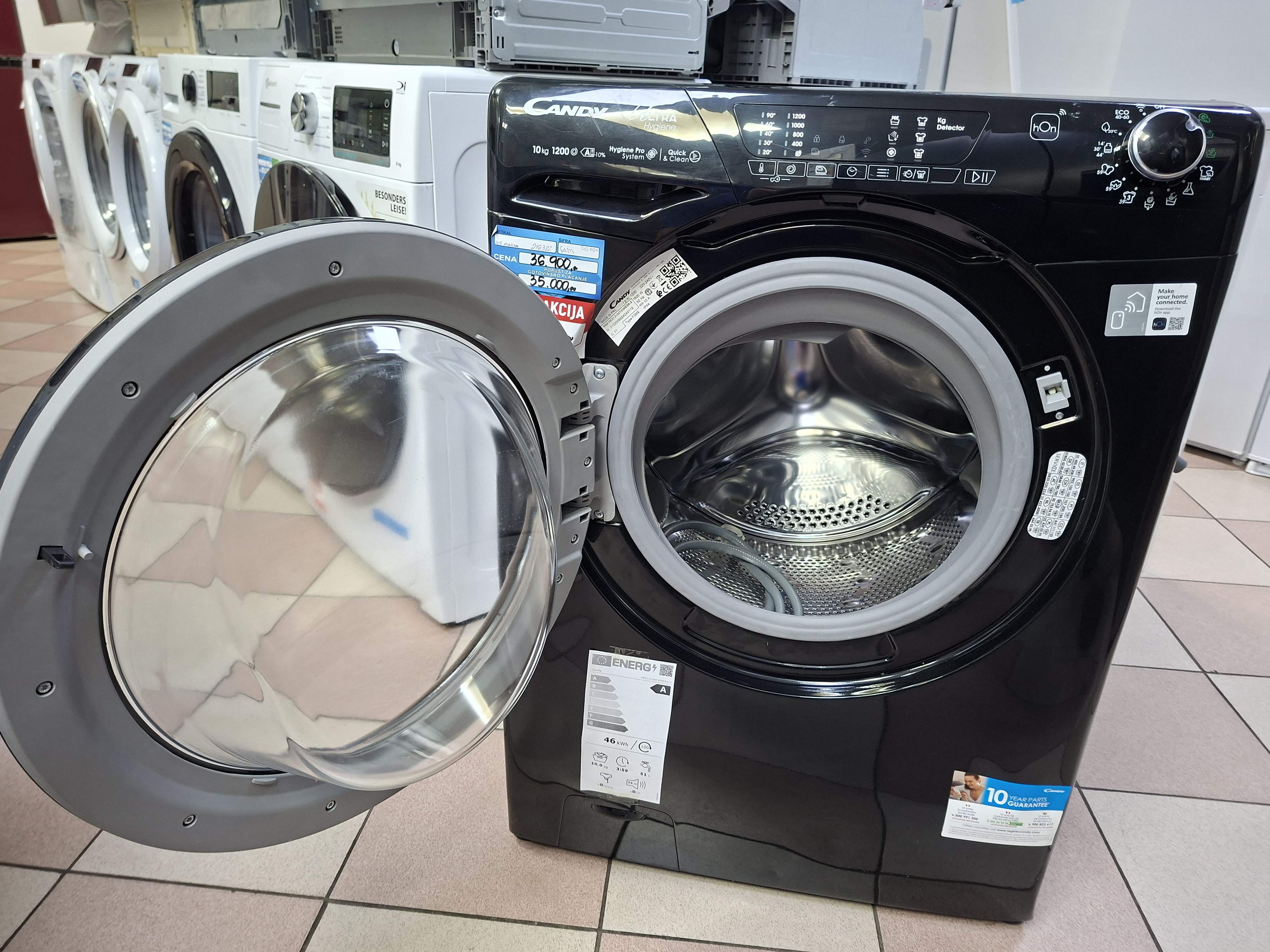 Veš mašina Candy HES12104TWMBB6-S , 10 kg.