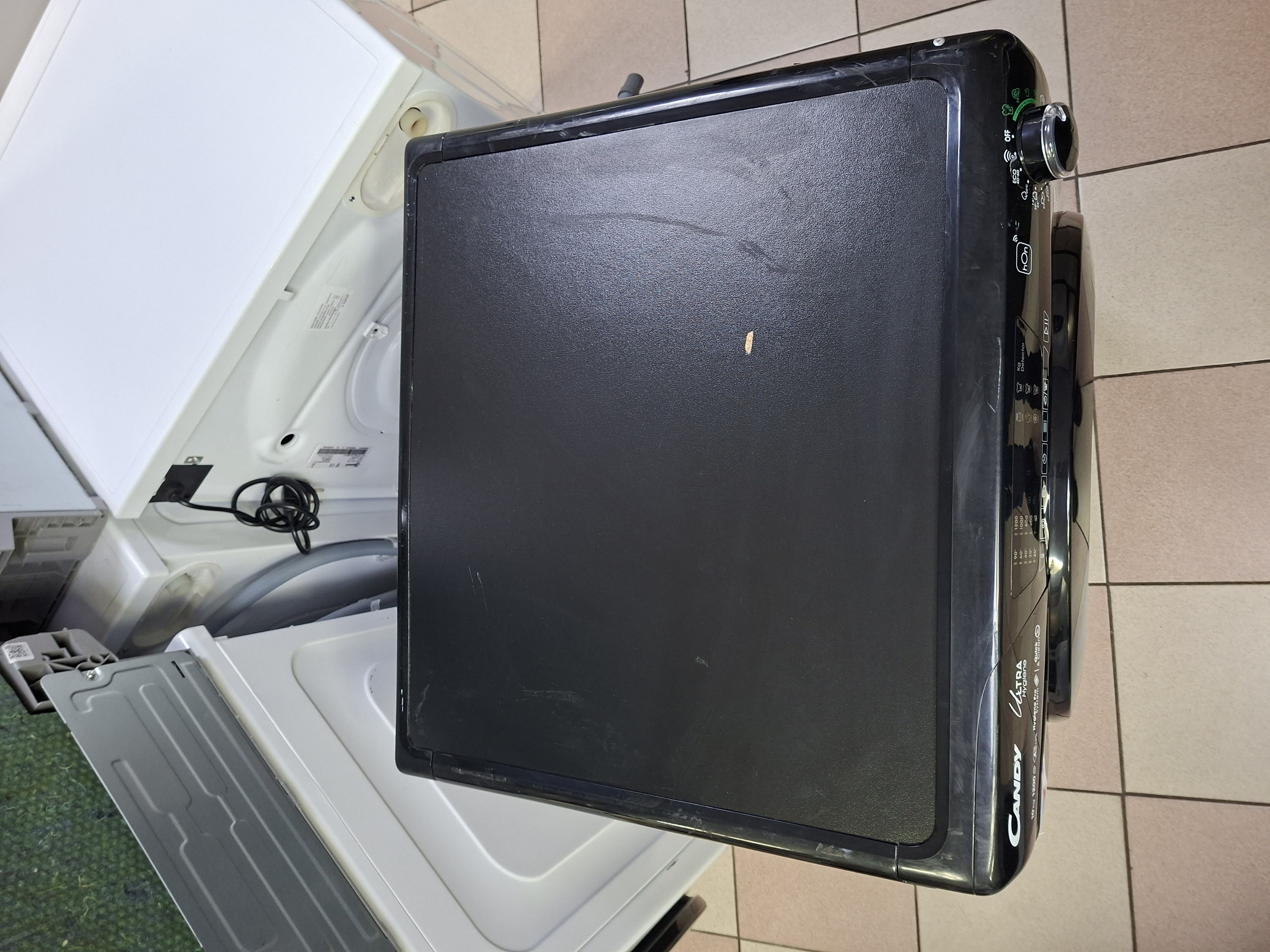 Veš mašina Candy HES12104TWMBB6-S , 10 kg.